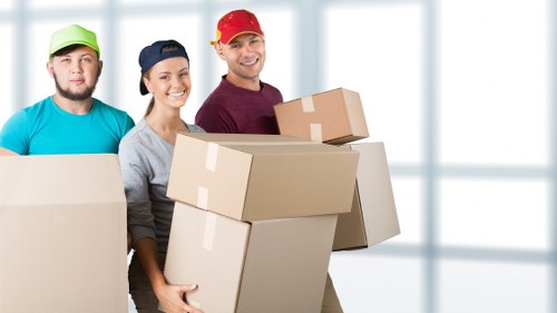 Packed self storage unit in Upton with labeled boxes and equipment