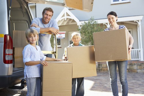 Packing boxes and fragile items handled by experts in Upton