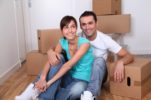 Professional movers handling furniture for small removals in Upton